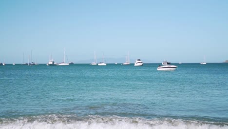 Panning-shot-of-yachts-and-sailboats-in-bay-on-Waiheke-Island,-New-Zealand