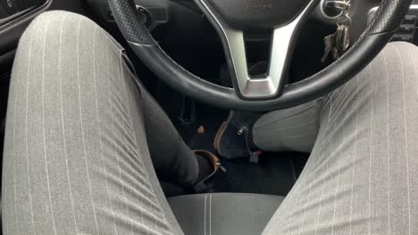 Impatient-Man-sitting-behind-steering-wheel-and-waiting