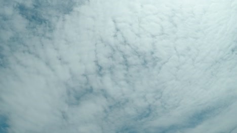 Timelapse-of-clouds-moving-overhead-on-a-partly-cloudy-day