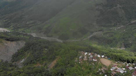 4k-Aerial-Backward-Dolly-shot-of-one-of-the-largest-village-Tuensang-of-Nagaland,-India