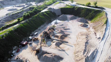 Aerial-shot-from-a-drone-of-quarry-and-heavy-machinery-in-pomeranian-district-in-Poland