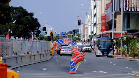 Road-works-and-sloweded-car-traffic---construction-of-screens-in-downtown-Auckland-CBD-in-New-Zealand---May-21,-2019