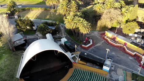 Aerial-view-of-colored-stands,-of-a-theater-located-in-the-park-on-a-sunny-day-Montevideo-Uruguay