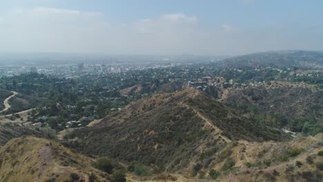 4K-60-FPS-Cinematic-Drone-footage-of-Griffith-Park-overlooking-the-Hollywood-Sign-in-Los-Angeles,-CA