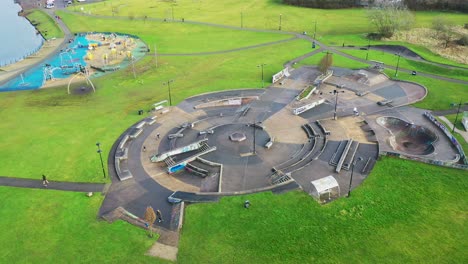 Aerial-view-of-Hanley-forest-park,-Central-forest-park,-Hanley-park,-Plaza-skatepark-in-Stoke-on-Trent-Staffordshire