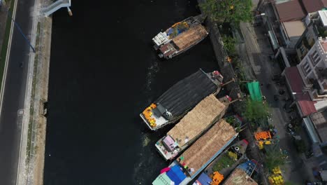 Aerial-view-of-bridge-and-floating-flower-market-in-Saigon-or-Ho-Chi-Minh-City-in-Vietnam