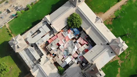 Aerial-Top-Down-View-Of-Empress-Market-Surrounded-By-Green-Gardens