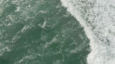 4k-Aerial-Top-Down-shots-of-waves-crashing-at-the-beaches-of-varkala-in-the-morning