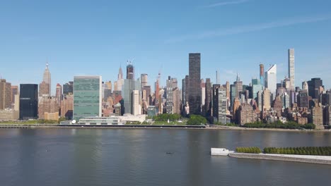 Panning-shot-of-East-Side-Manhattan-filmed-from-Long-Island-City-on-a-sunny-summer-day