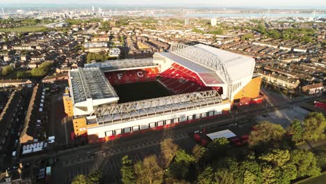 Iconic-Liverpool-LFC-Anfield-stadium-football-ground-aerial-view-slow-zoom-out-reveal