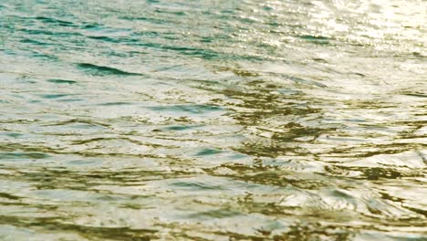 Rippling-Water-On-The-Ocean-With-Waves-And-Sunlight-Reflection-In-Willemstad,-Curacao