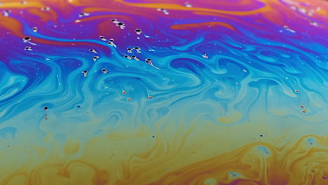 Close-up-footage-of-the-colourful-surface-of-a-soap-bubble