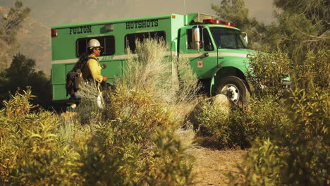 Firefighting-ground-crew-serviceman-tackling-California-bush-fire-blaze