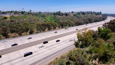 Highway-i805-in-California-with-low-traffic-due-to-the-COVID19-pandemic,-Locked-high-angle-shot