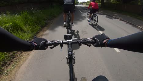 POV-View-Cycling-Through-Residential-Road-In-Chalfont,-UK