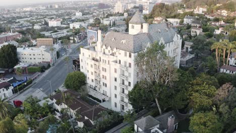 Aerial-drone-shot-flying-alongside-the-famous-Chateau-Marmont-hotel-in-West-Hollywood