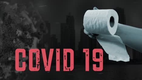 A-hand-is-holding-a-toilet-paper-roll-near-a-picture-of-a-virus-with-the-name-Covid19