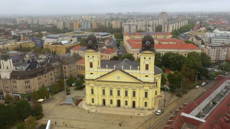 Drone-footage-from-the-Church-at-Debrecen-citys-main-squarein-rainy-weather-autumn-Drone-closes-up-right-and-left-very-close