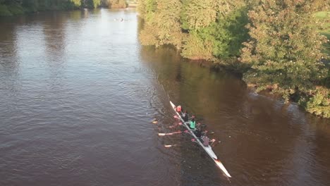 A-close-up-of-a-slow-motion-of-a-group-of-rowers-rowing-out-of-shot