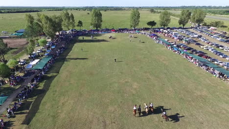 Aerial-View-of-Traditional-Equestrian-and-Horse-Dressage-Fiesta-Event,-Santa-Fe-Province,-Argentina