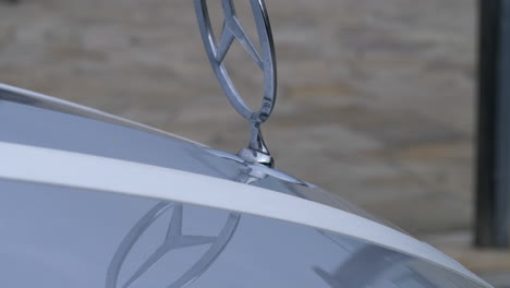 CLOSE-UP-of-A-Mercedes-Benz-Car-Ornament-With-Wedding-Ribbon