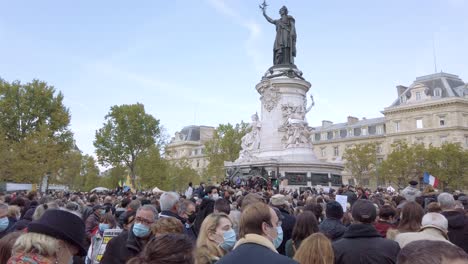 People-Gathering-Place-De-La-Republique-in-Honor-of-Samuel-Paty,-The-Teacher-killed-by-a-Terrorist-in-Conflans,-Paris-France