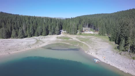 Drone-footage-from-forest-to-lake