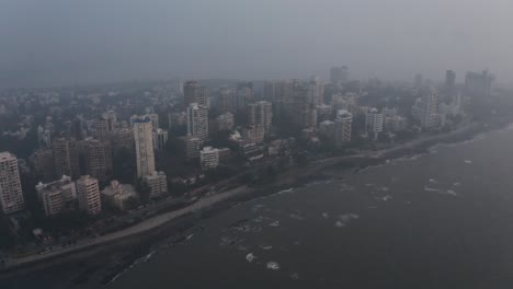 Cinematic-crane-drone-shot-of-Mumbai-coast-BJ-road-Bandstand-hazy
