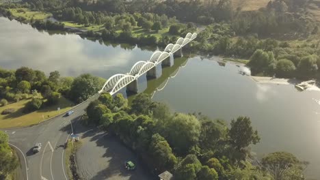 Drone-footage-of-a-white-bridge-across-a-river-in-New-Zealand-north-island