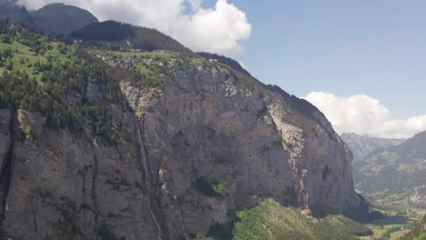 Tilt-down-of-large-mountain-rock-wall
