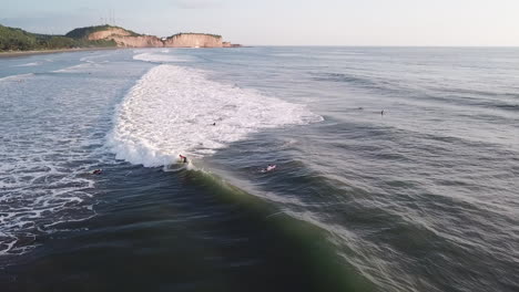 Professional-Surfer-Riding-Perfect-Sea-Waves-During-Summer-In-Olon-Beach,-Ecuador
