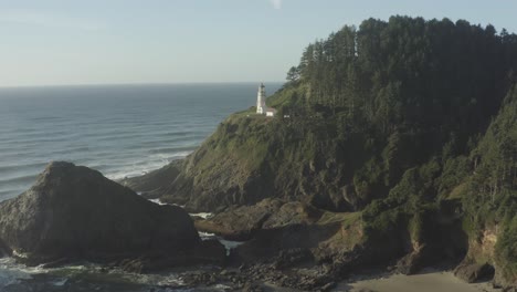 Wide-panning-aerial-of-Haceta-Head-lighthouse-in-Oregon