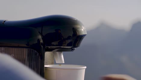 Making-coffee-at-the-top-of-a-mountain-in-Norway-using-a-machine