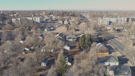 A-drone-drops-down-over-the-east-side-of-suburban-Greeley-Colorado-showing-the-older-architecture-and-dry-climate-during-the-winter-of-2020