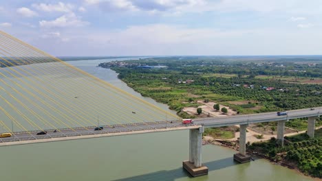Vehicles-Crossing-Mekong-River-Through-Tsubasa-Bridge-In-Neak-Loeung-Near-Phnom-Penh-In-Cambodia