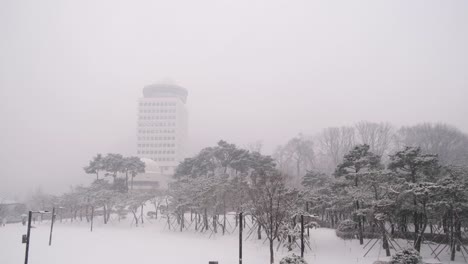 Heavy-snow-storm-blizzard-in-Seoul,-cinematic-skyline-cityscape,-extreme-weather