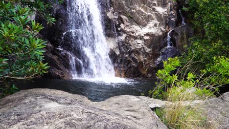 Harmonious-scenery-of-pure-rocky-waterfall-in-tropical-jungle,-Vietnam