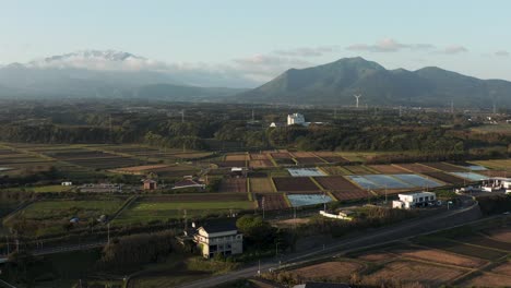 Tottori-Prefecture-Rural-Landscape-and-Mt-Daisen,-Aerial-Pan-Shot