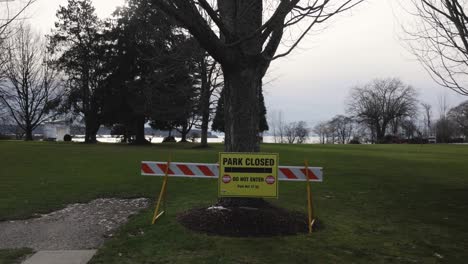 Park-Closed-Do-not-enter-signs-block-approaching-entrance-to-public-space-during-COVID-19-closures-recommendations