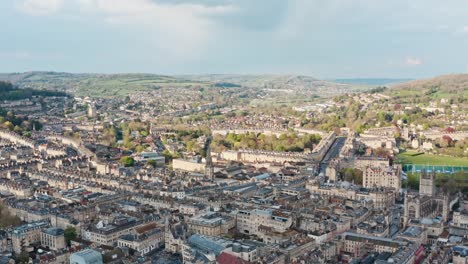Dolly-back-drone-shot-over-old-buildings-in-Bath-UK