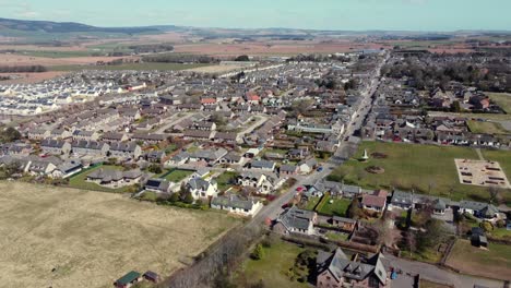Aerial-view-of-the-Scottish-town-of-Laurencekirk-on-a-sunny-spring-day,-Aberdeenshire,-Scotland