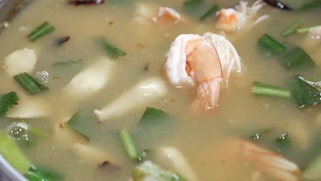 Close-Up-Footage-of-Thai-Style-Clear-Tom-Yum-Kung-Soup,-Spicy-and-Sour-Prawn-Soup