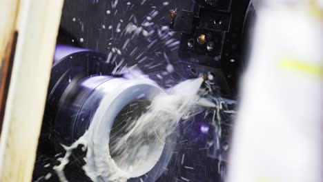 CNC-milling-machine-in-operation-cutting-steel-in-a-high-tech-machineshop