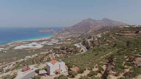 Road-with-magical-view-to-Falasarna-beach-in-Crete-island,-aerial-drone-view