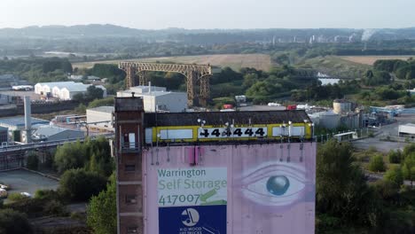 Iconic-Warrington-Pink-eye-Fairclough-Mill-self-storage-building-aerial-view-fly-over