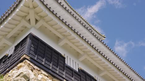 Roof-of-Gifu-Castle,-Slow-Pan-Shot-on-Sunny-Day,-Japan