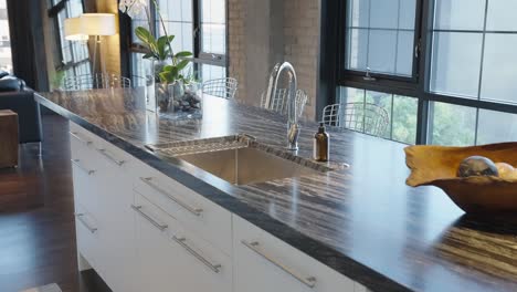 Modern-Kitchen-Sink-on-a-dark-countertop-in-a-Modern-Home