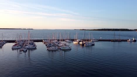 sailing-boats,-top-view-in-Marina,-docked-at-the-pier-during-the-sunset-08