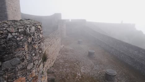 Tilt-from-battlements-to-a-Portuguese-flag-on-Castle-MarvÃ£o