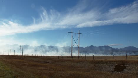 Smoke-from-fire-by-the-powerlines-wide